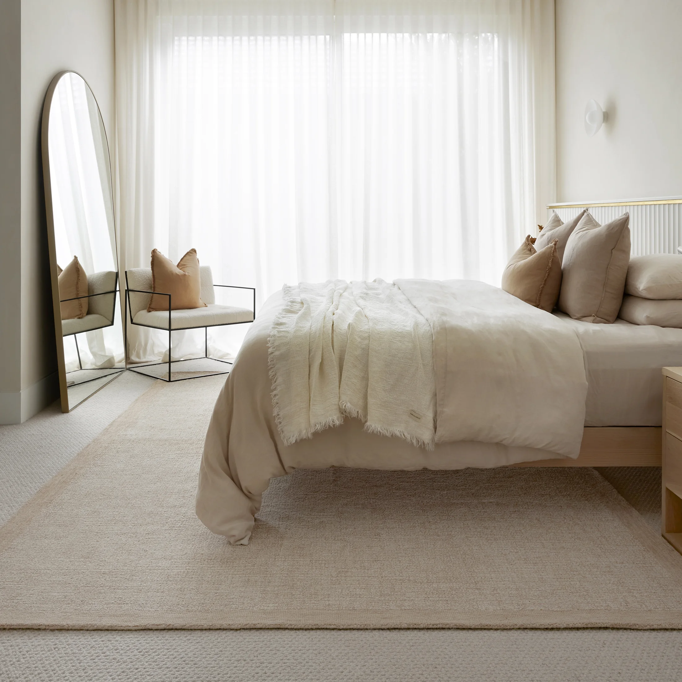 Mila Wheat wool rug in a relaxed bedroom